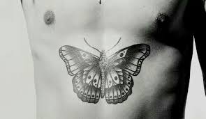 Black And White Harry Styles Butterfly Tattoo The Butterfly On His Torso Is Based On And Old French Prison Tattoo Inspired By Papillon Traditionally It Would Harry Styles Butterfly Prison Tattoos Tattoos