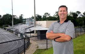 Longtime Titans coach Kevin McElveen settles into AD role at ...