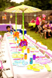 Birthday Party Table Decorations For Kids What A Fantastic Way To Decorate The Kids Table At Your Moana Birthday Party See More Party Ideas And With Images Luau Birthday Party Luau Birthday Summer Birthday Party