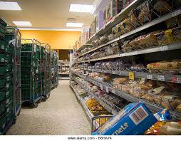 A 24 Hour Supermarket Isle During The Late Shift Workers Re Stock Shelves Whilst Shoppers Shop Stock Image Supermarket Stacking Shelves Stock Photography