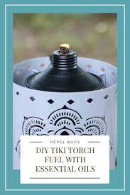 How To Make Homemade Diy Tiki Torch Fuel With Essential Oils This Is Great For Backyards To Repel Mosquit Diy Bug Repellent Repellent Diy Diy Citronella Torch
