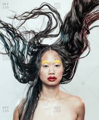 Take our quiz along with henry golding in celebration of the release of their film crazy rich asians, we had henry golding, constance wu, gemma chan, and michelle yeoh take a. Portrait Of An Asian Woman With Crazy Makeup Her Hair Standing Up Stock Photo Offset