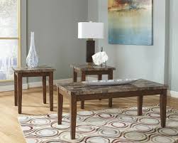 Centre your living room with perfect pieces of personal style and convenient space. Ashley Theo Warm Brown Occasional Table Set On Sale At Furniture And Mattress Warehouse Serving Holland Mi