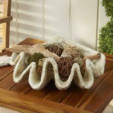 I just think that this one piece of coastal home decor is simply an essential for a beach house. 29 Clam Shells Decor Ideas Shell Decor Giant Clam Shell Giant Clam