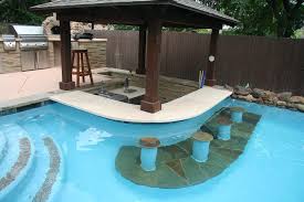 Pool With Sunken Bar We Can Help You Build Your Pool Spa And Outdoorliving Space Www Geremiapools Com Pool Bar Design Pool House Designs Pool Patio