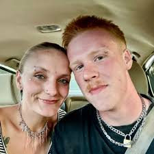 Who is a recommended tattoo artist in Huntsville for cover-ups of small  black text tattoos?