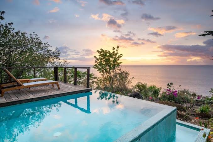 Your private sanctuary overlooking the Caribbean Sea, AI generated