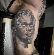 5 things to know about israel adesanya's tattoos adesanya has attained great heights following his rise and dominance in the lightweight division of the ufc. Ufc Middleweight Champion Israel Stylebender Adesanya On The Bicep Done By Zac Ryan At Inkfamous Tattoo Parlor In Redlands C Tattoo Parlors Tattoos Redlands