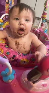 What can I do to get my 6-month-old baby to eat solids?