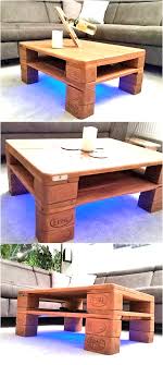 Reclaimed wood is arranged in a striking herringbone pattern on this coffee table. Recycled Pallet Wood Table Pallet Ideas