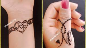 The ring finger is a great idea when it comes to tattoo designs which are just alphabets. 6 Beautiful P Letter Rings Mehndi Design Stylish Elegant Finger Ring Jewellery Mehndi Design Youtube