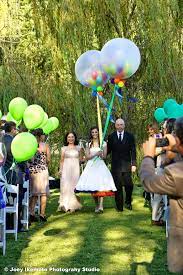 The spectacular colors of balloons have always allured us, captivating our hearts and minds. Giant Balloon Filled Balloons As A Wedding Bouquet Alternative Wedding Balloons Carnival Wedding Theme Carnival Wedding