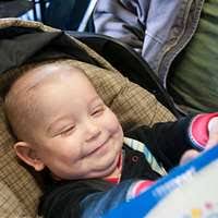 Violet Scott, newborn, sleeps in her car seat during