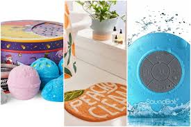 Pretty young woman in bathing suit is talking on mobile phone and drinking champagne while taking bath in spa salon. Best Holiday Gift Ideas For Bath Lovers Teen Vogue