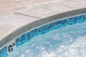 A pool coping gives a protective cover on the top of the sidewalls of a pool, and also defines a border by being an edge of the pool deck structure. Pin On Lna Pool