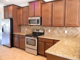 Image Result For Cinnamon Cabinets Tan Granite Tumbled Marble Backsplash Travertine Backsplash Kitchen Remodel Granite Kitchen