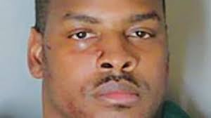 Former Detroit police lieutenant pleads guilty to bribery charge