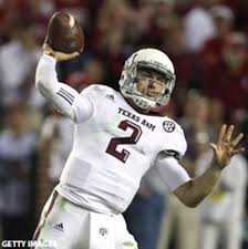 Johnny manziel watches play between the texas a&m aggies and the arkansas. Manziel Family Texas A M Working To Trademark Johnny Football Nickname