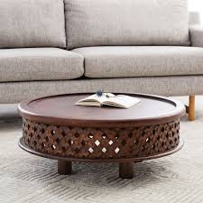 Iron metal round coffee table. Carved Wood Coffee Table