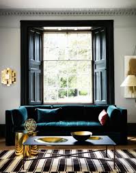 Sophisticated Living Room With Teal Sofa And Brass Accessories The Room Edit Blue Sofas Living Room Teal Living Room Decor Teal Living Rooms