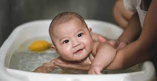 What causes fever in babies? Baby Bath Temperature What S The Ideal Plus More Bathing Tips
