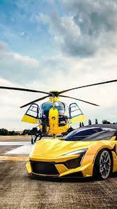 Helicopter And Fenyr Supersport 720x1280 Wallpaper Car Iphone Wallpaper Iphone Dynamic Wallpaper Sports Cars Luxury