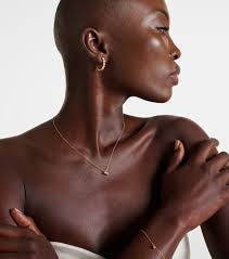 Boucle Ensemble 18kt gold earrings with diamonds in gold