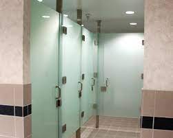 Glass reflects the light around it, helping to lighten and brighten any area where it is installed, making it the perfect addition to bathrooms and showers where natural light is often scarce. Crl S Frameless All Glass Restroom Partition System Will Modernize Any Commercial Bathroom Area With Restroom Design Restroom Remodel Frameless Shower Doors