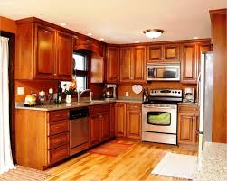 Choose light colored kitchen tile floors with oak cabinets to look darker. 41 Attractive Kitchen With Maple Cabinets Color Ideas Gongetech