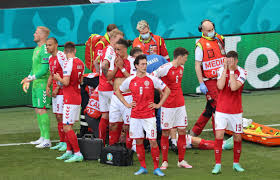 .christian eriksen receive medical attention after collapsing on the field in the first half of the game. C8nxbu6xxnn3pm