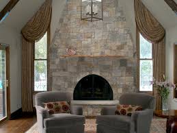 Stacked stone fireplaces allows us to bring comfort and cozyness into decors and spaces that you can complement the stones and the warmth of the fireplace with other natural textures and materials. Natural Stone Fireplaces Hgtv