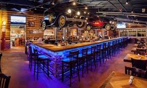 Ford S Garage Restaurants Serve Up The Blue Oval Other Branded Merchandise Crain S Detroit Business Garage Design Garage Bar Garage