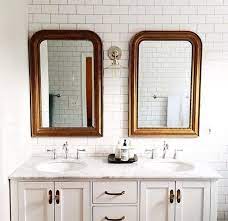 As reference, for the recent bathroom renovation, i installed the mirrors at 44 inches from the floor, which is 9 inches between the sink and. Mirrors With Light Between Bright Bathroom Bathroom Design Bathroom