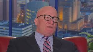 Attorney Michael Benson speaks