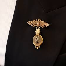 suit pin brooch