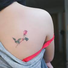 Pink Rose Tattoo On The Right Shoulder Blade Tattoos Wrist Tattoos For Guys Animal Tattoos