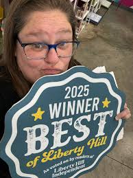 There are a couple of bald eagles circling the water tower in Liberty Hill.￼