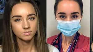 Peter Andre and doctor wife Emily beam behind their masks as she gets first  Covid jab