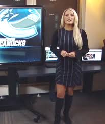 A late season sensational surprise denim dress and boots combo from bianca peters. Booted Newswomen