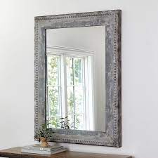 The rustic weathered finish of our zinc framed mirror reminds us of the metal flower pots you see outside the country houses of southern france. Rectangular Beaded Zinc Wall Mirror