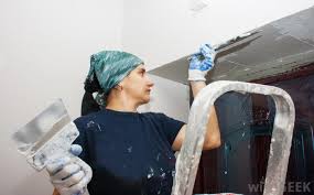 Apply more plaster or joint compound mixture over the tape and use the drywall knife to smooth the surface until it's even with the wall, pressing to remove pockets of air and plaster/drywall mud from beneath the tape. How Do I Repair Cracks In Walls With Pictures