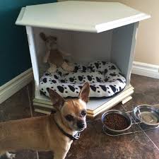 This modern cantilevered table with plush foam dog bed underneath is the perfect accent piece for your home. 15 Stylish Pet Beds That Also Serve As Great Looking Tables