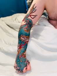 Upper sleeve decorated with firemen and flaming dragon tattoo. Dragon Sleeve By Max Wolf Sparrow Tattoo Roselle Il Tattoo