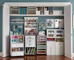 A desk, tall shelves and cubbies give an organized crafter room to work. Facebook