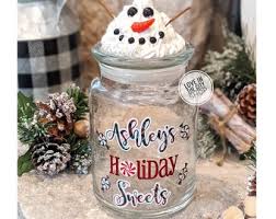 Once you have all of your supplies, start by spray painting the lid of the mason jar. Christmas Candy Jar Etsy