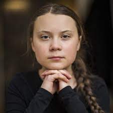 The sticker has been digitally edited into the photo. Greta Thunberg Gretathunberg Twitter