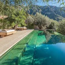 A Bohemian Winter Holiday Home In Mallorca Elle Decoration Uk Outdoor Pool Swimming Pool Designs Outdoor