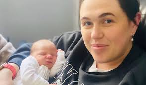 Lily Allen sits in first class while daughter flies economy