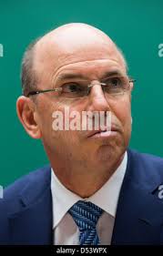 United States Steel Chairman John Surma, sits