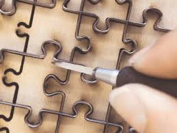 The very first jigsaw puzzles were made out of wood in europe in the 1760s and initially were just maps cut into little pieces that fit together. How A Puzzle Is Created